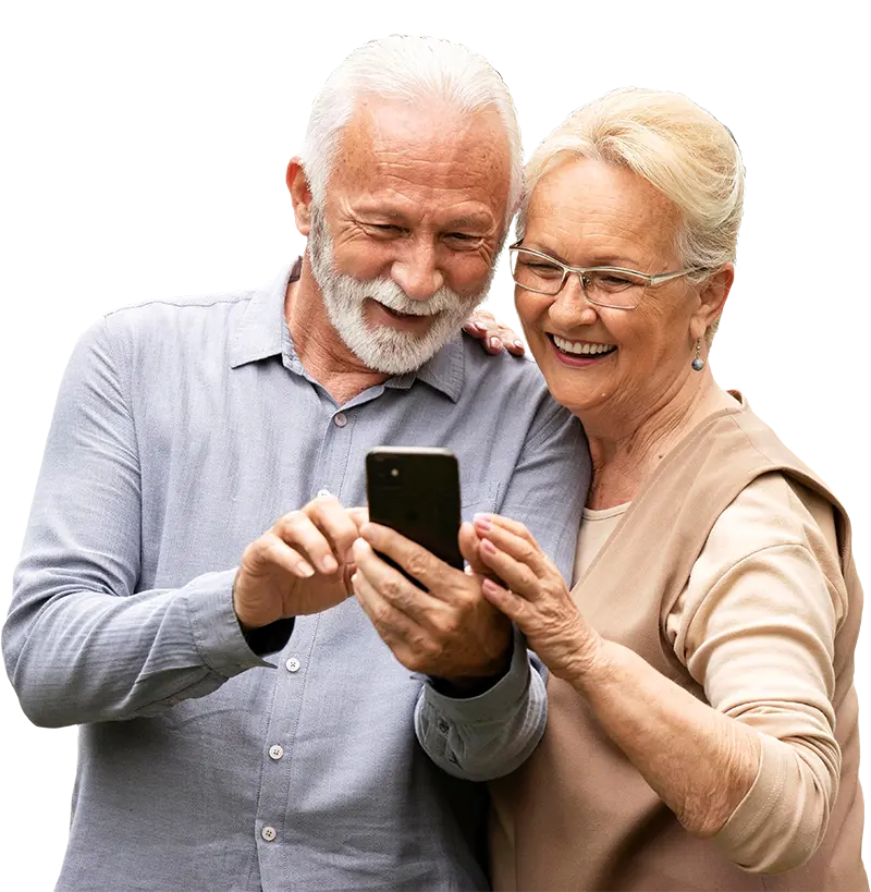 Smiling senior couple using a smartphone together – exploring term life insurance options in Canada